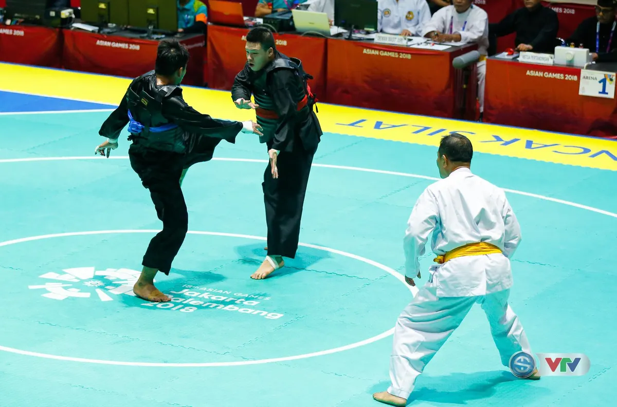 ASIAD 2018: Nguyễn Văn Trí đem về tấm HCV đầu tiên cho Pencak Silat - Ảnh 1. ASIAD 2018: Nguyễn Văn Trí đem về tấm HCV đầu tiên cho Pencak Silat - Ảnh 1.