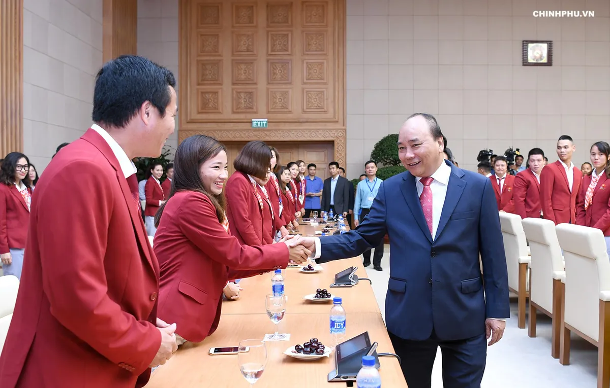 Thủ tướng gặp mặt đo&agrave;n thể thao Việt Nam dự ASIAD 2018 - Ảnh 2.