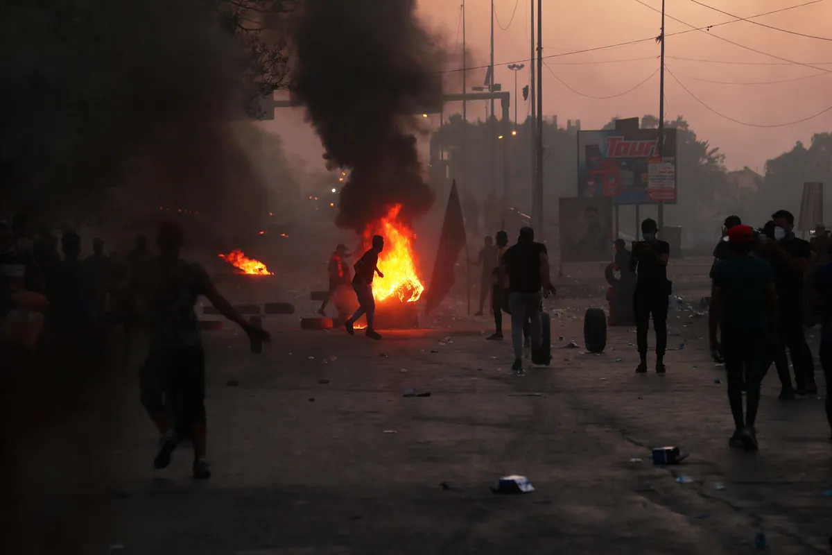 Iraq bãi bỏ lệnh giới nghiêm ở thủ đô Baghdad - Ảnh 2.