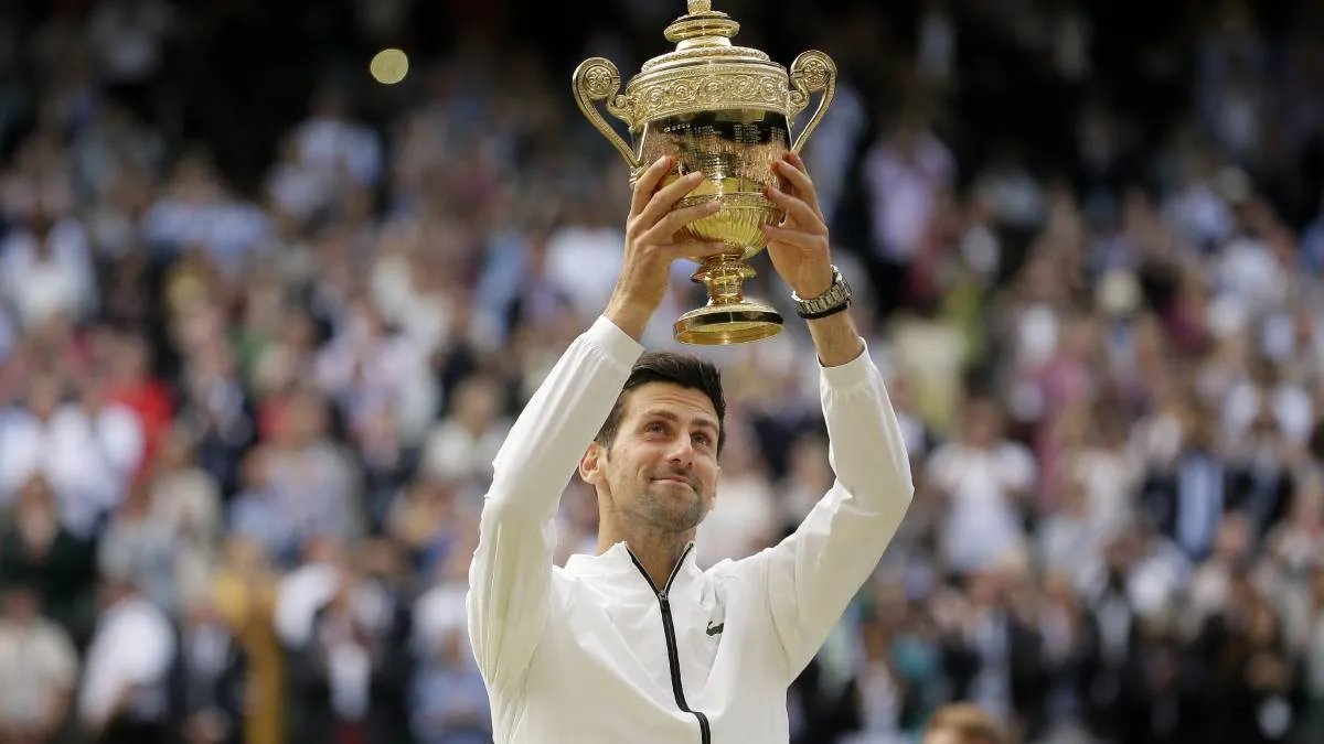Vô địch Wimbledon, Djokovic thổi lửa vào cuộc đua Grand Slam - Ảnh 1. Vô địch Wimbledon, Djokovic thổi lửa vào cuộc đua Grand Slam - Ảnh 1.