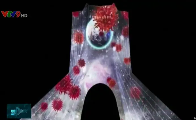 Tr&igrave;nh diễn &aacute;nh s&aacute;ng h&igrave;nh ảnh virus Corona l&ecirc;n t&ograve;a th&aacute;p Azadi - Ảnh 1.