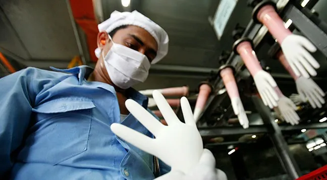 Nhóm cổ phiếu công ty sản xuất găng tay tăng mạnh thời COVID-19 - Ảnh 1.