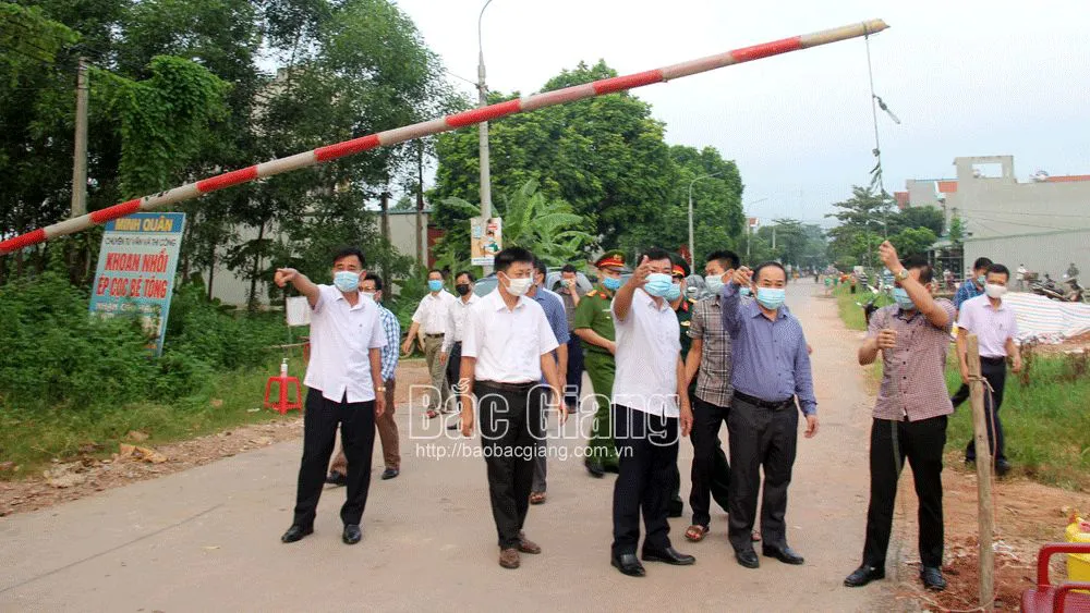 Bắc Giang dỡ bỏ cách ly ổ dịch có 6 người cùng gia đình mắc COVID-19 - Ảnh 1.