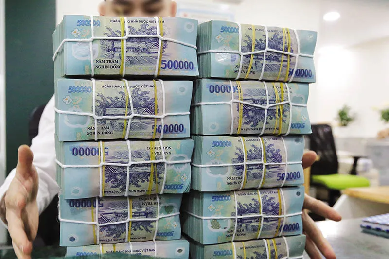 Ng&acirc;n h&agrave;ng quyết kh&ocirc;ng hạ chuẩn t&iacute;n dụng - Ảnh 1.