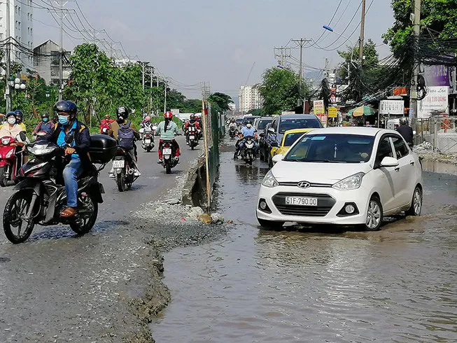 Dự án giao thông chậm tiến độ trói chân TP Hồ Chí Minh - Ảnh 3.