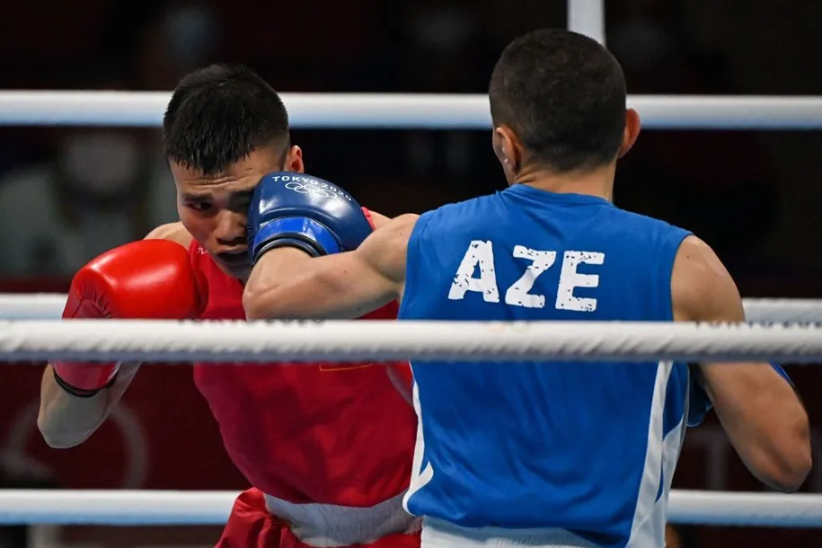 Nguyễn Văn Đương lập kỳ tích cho Boxing Việt Nam ở Olympic sau 33 năm - Ảnh 2.