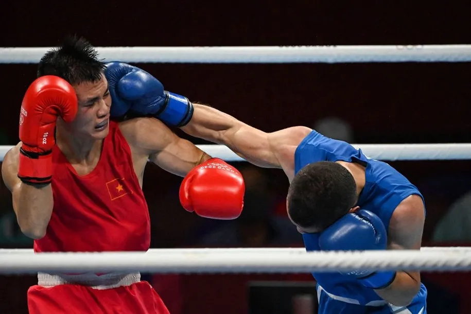 Nguyễn Văn Đương lập kỳ tích cho Boxing Việt Nam ở Olympic sau 33 năm - Ảnh 3.