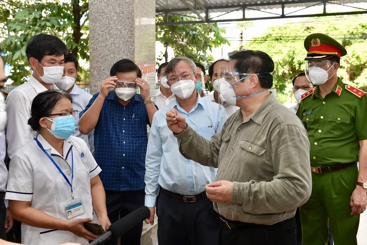 Thủ tướng Phạm Minh Chính thăm hỏi, động viên nhân dân Đồng Nai yên tâm, tích cực chống dịch - Ảnh 2.