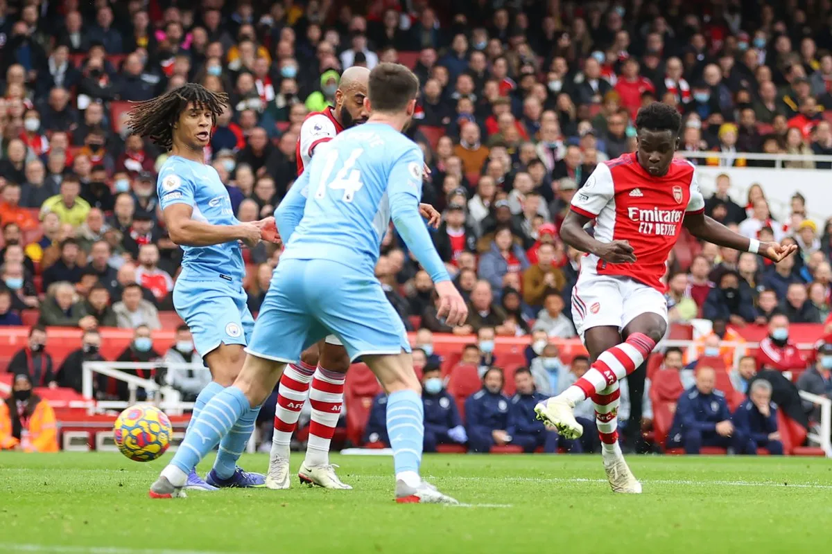 Man City ngược dòng ấn tượng trước Arsenal - Ảnh 1. Man City ngược dòng ấn tượng trước Arsenal - Ảnh 1.