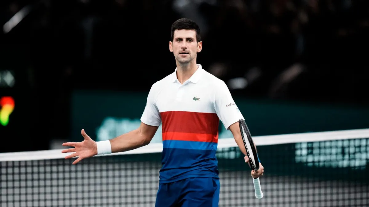 Djokovic tìm cách chứng minh mình mắc COVID-19 vào tháng 12/2021 - Ảnh 1. Djokovic tìm cách chứng minh mình mắc COVID-19 vào tháng 12/2021 - Ảnh 1.