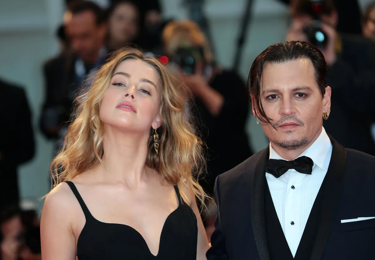 Đưa nhau ra toà, Amber Heard vẫn hy vọng tương lai tích cực với Johnny Depp - Ảnh 1.