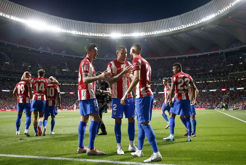 Carrasco ấn định chiến thắng cho Atletico trong trận derby với Real Madrid - Ảnh 3.
