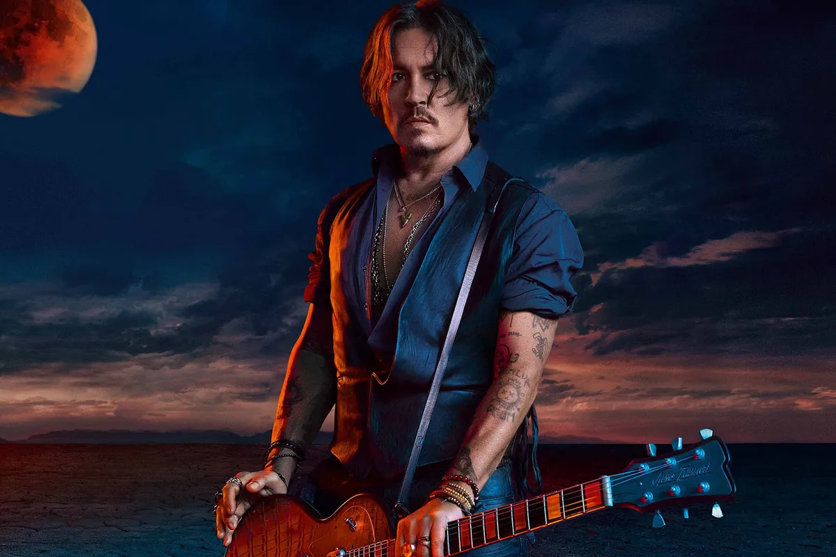 Johnny Depp kín tiếng hơn hậu thắng kiện - Ảnh 1.