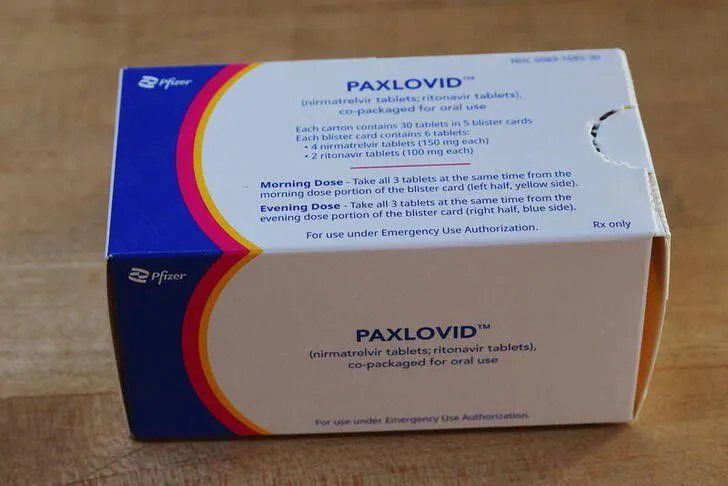 Mỹ cho phép kê đơn thuốc điều trị COVID-19 Paxlovid trong một số điều kiện nhất định - Ảnh 1.