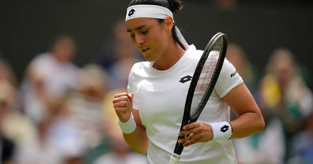 Ons Jabeur làm nên lịch sử khi vào chung kết Wimbledon 2022 - Ảnh 1. Ons Jabeur làm nên lịch sử khi vào chung kết Wimbledon 2022 - Ảnh 1.