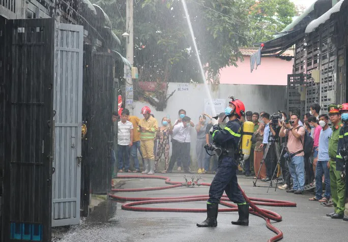 TP Hồ Chí Minh: Diễn tập tổ liên gia phòng cháy chữa cháy - Ảnh 1.