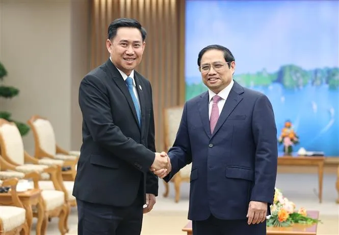 Việt Nam luôn coi trọng và không ngừng vun đắp mối quan hệ vĩ đại với Lào - Ảnh 1.