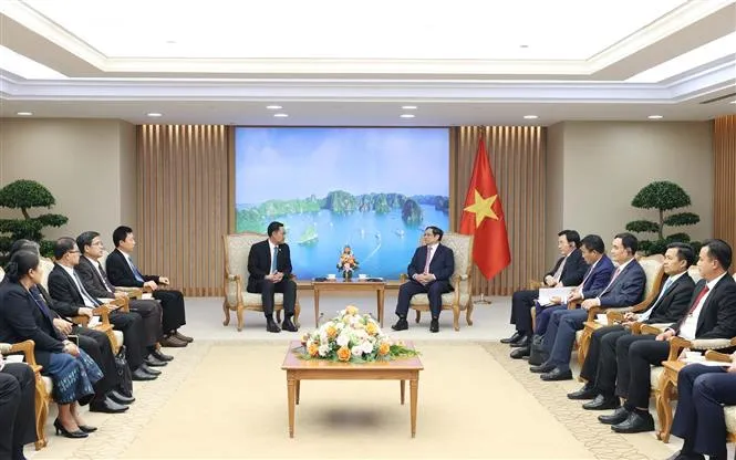 Việt Nam luôn coi trọng và không ngừng vun đắp mối quan hệ vĩ đại với Lào - Ảnh 2.