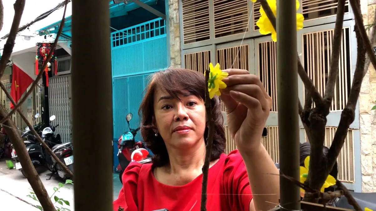 Cư d&acirc;n trong hẻm c&ugrave;ng nhau đ&oacute;n Tết - Ảnh 3.