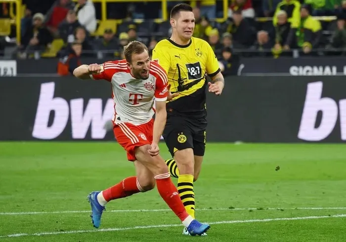 Harry Kane tỏa sáng giúp Bayern Munich vượt qua Dortmund - Ảnh 2. Harry Kane tỏa sáng giúp Bayern Munich vượt qua Dortmund - Ảnh 2.