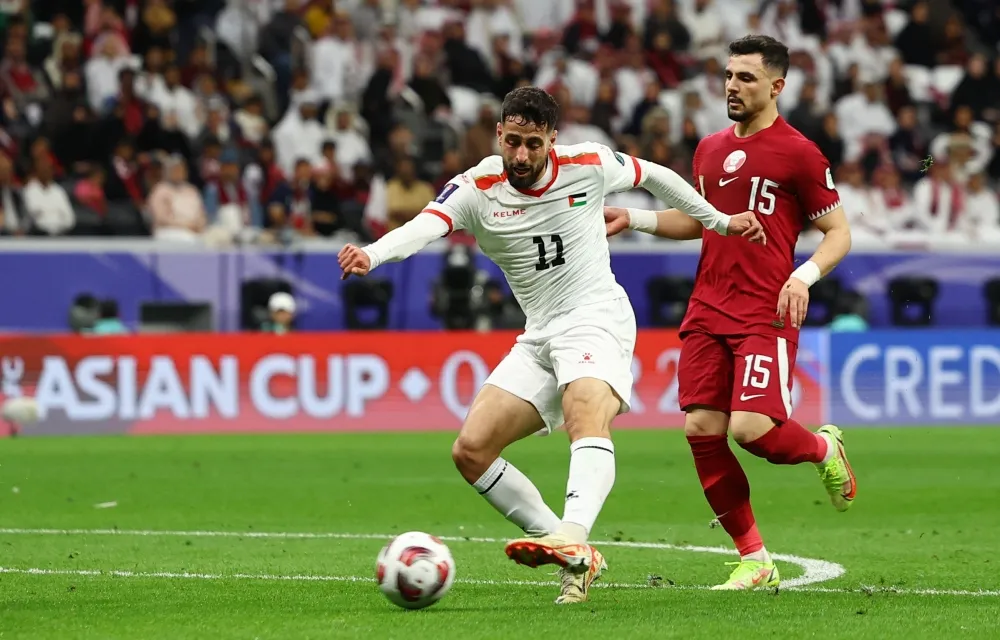 Asian Cup 2023 | ĐT Qatar ngược dòng vượt qua ĐT Palestine - Ảnh 1. Asian Cup 2023 | ĐT Qatar ngược dòng vượt qua ĐT Palestine - Ảnh 1.