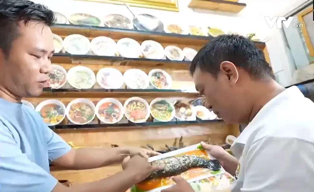 Độc đáo hàng trăm món ăn Việt sống động... từ đất sét - Ảnh 1.