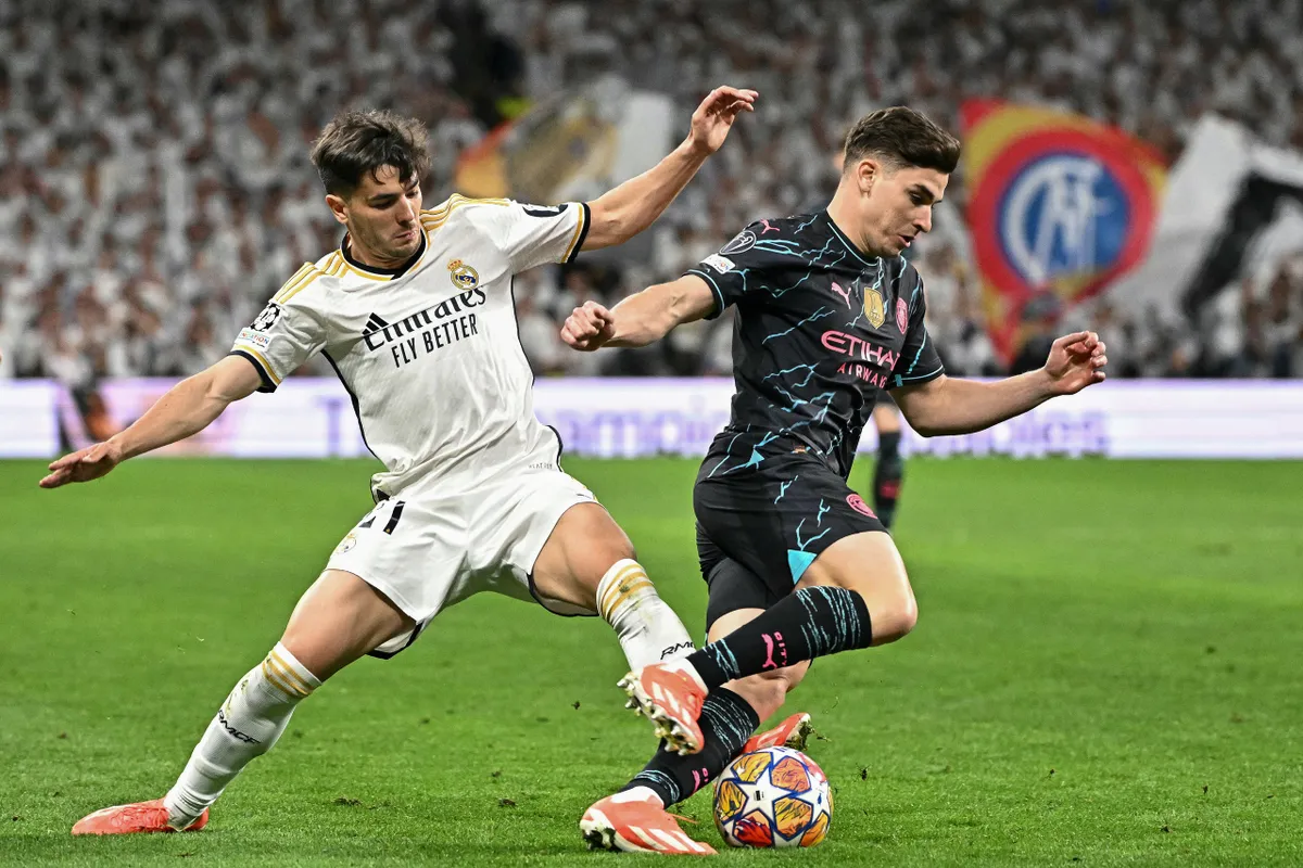 Kết quả tứ kết Champions League sáng 10/4: Arsenal hòa Bayern Munich, Real Madrid bất phân thắng bại Man City   - Ảnh 2.