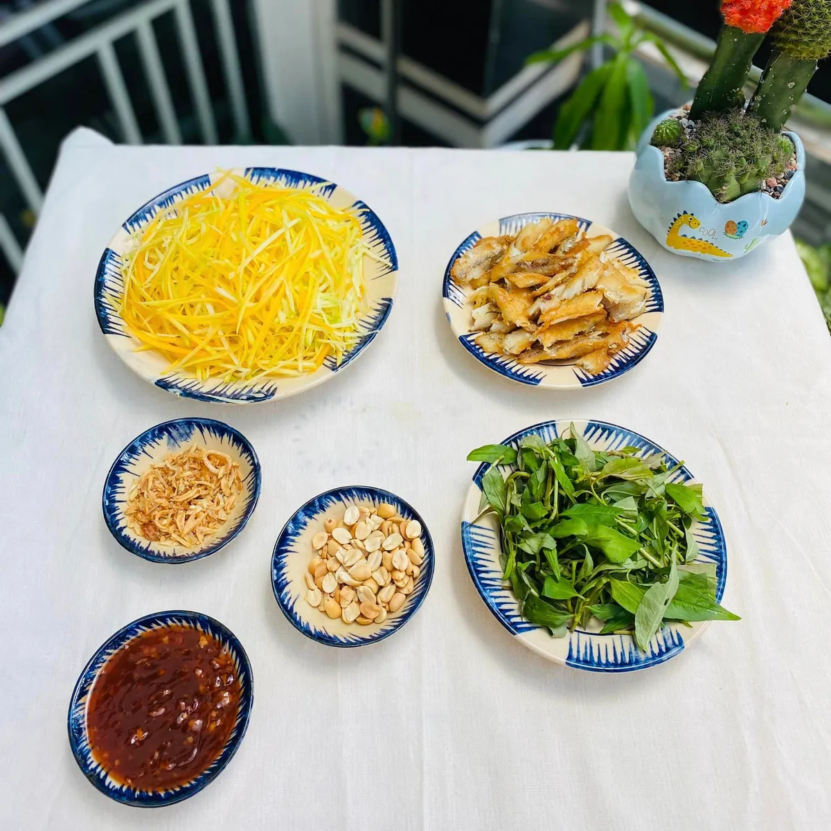 Cách làm gỏi cá 1 nắng đu đủ cực ngon - Ảnh 4. Cách làm gỏi cá 1 nắng đu đủ cực ngon - Ảnh 4.