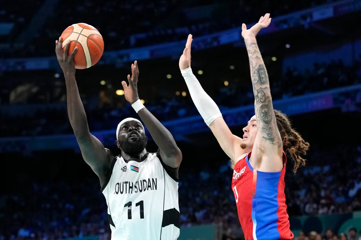 Chiến thắng lịch sử của bóng rổ Nam Sudan tại Olympic Paris 2024 - Ảnh 1. Chiến thắng lịch sử của bóng rổ Nam Sudan tại Olympic Paris 2024 - Ảnh 1.