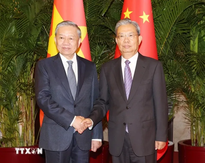 Tổng B&iacute; thư, Chủ tịch nước T&ocirc; L&acirc;m hội kiến Ủy vi&ecirc;n trưởng Nh&acirc;n đại to&agrave;n quốc Trung Quốc Triệu Lạc Tế - Ảnh 1.