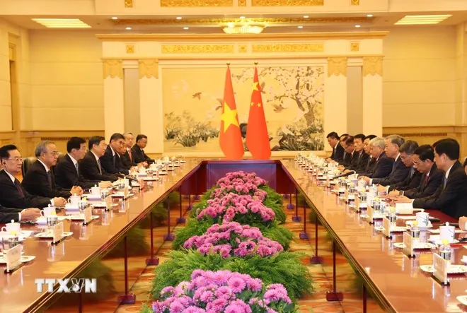 Tổng B&iacute; thư, Chủ tịch nước T&ocirc; L&acirc;m hội kiến Chủ tịch Ch&iacute;nh hiệp To&agrave;n quốc Trung Quốc Vương Hộ Ninh - Ảnh 1.