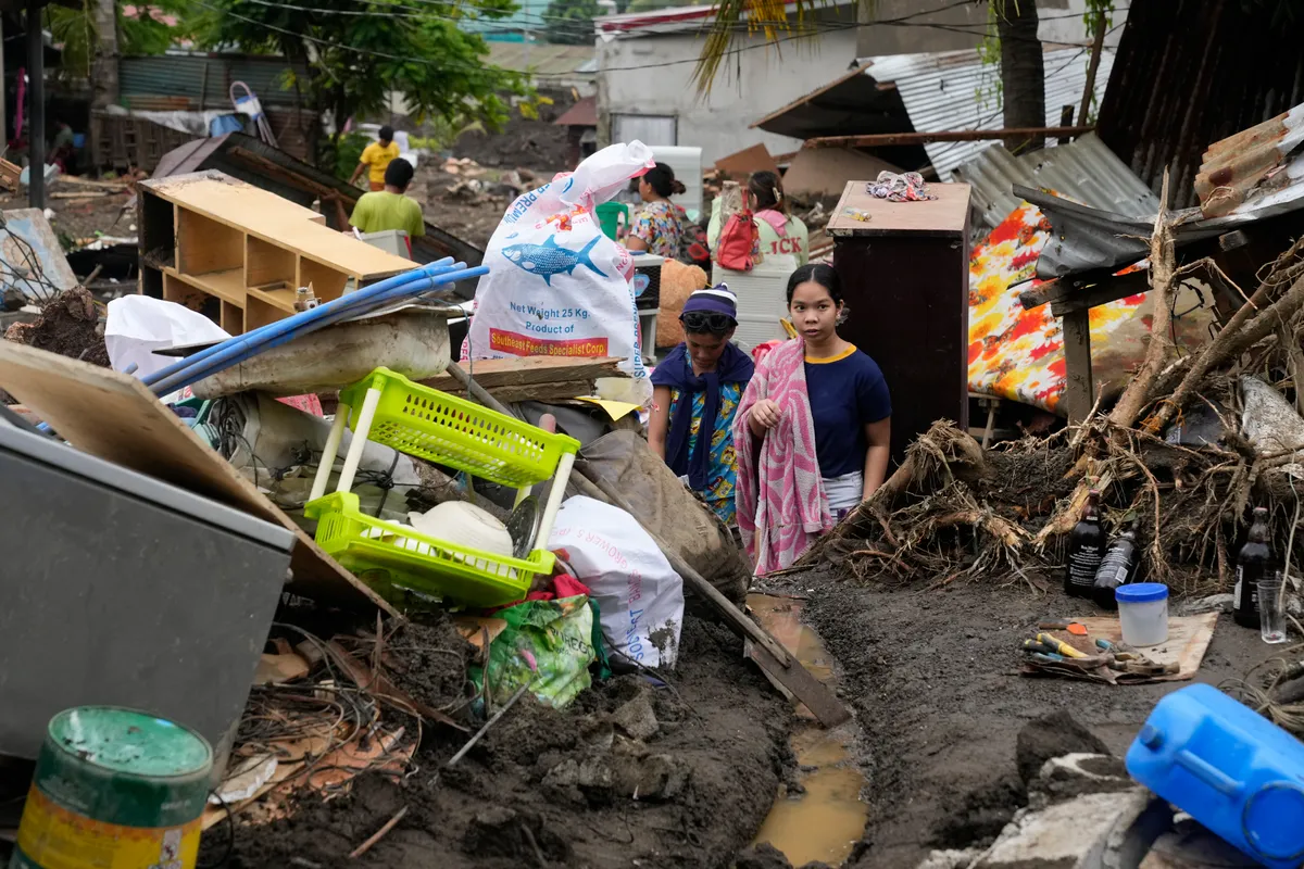 Philippines nỗ lực khắc phục hậu quả sau bão Trami - Ảnh 1.