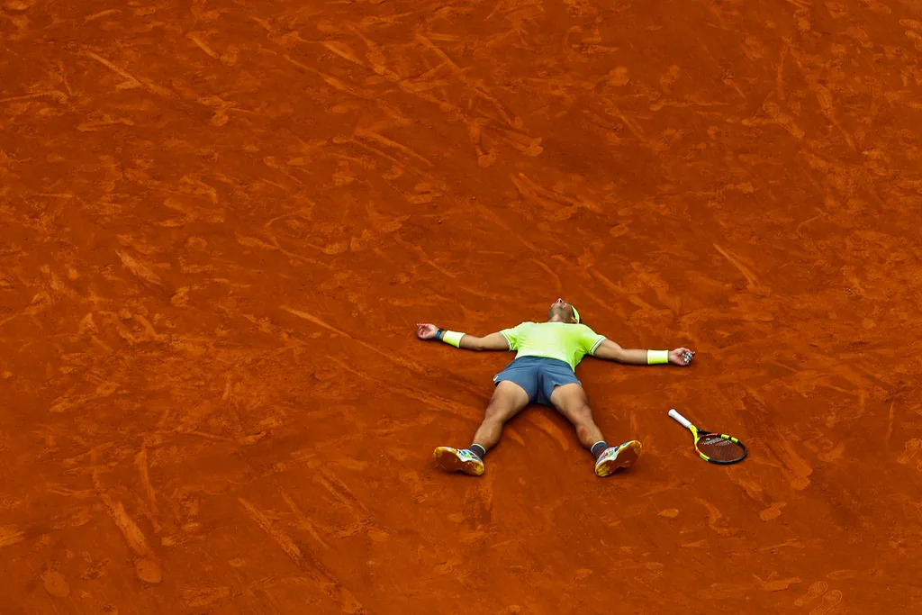 Những kỷ lục kh&oacute; bị ph&aacute; vỡ của Rafael Nadal tr&ecirc;n mặt s&acirc;n đất nện - Ảnh 2.