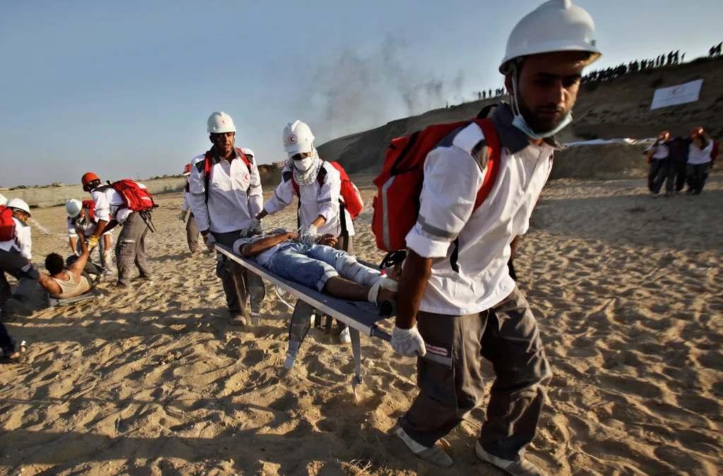 Liên hợp quốc dừng chuyển hàng cứu trợ qua cửa khẩu Israel vào Gaza - Ảnh 1.