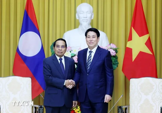 Chủ tịch nước Lương Cường tiếp Thường trực Ban B&iacute; thư Đảng Nh&acirc;n d&acirc;n C&aacute;ch mạng L&agrave;o - Ảnh 1.