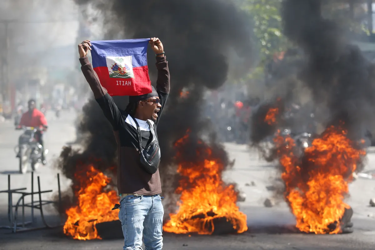 Xả súng tại cuộc họp báo ở Haiti, 3 người thiệt mạng, nhiều người bị thương - Ảnh 2.