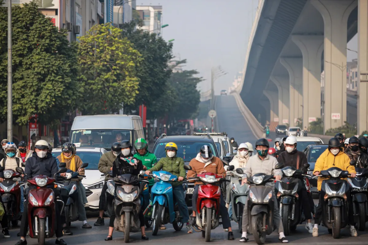 Cảnh sát giao thông Hà Nội xử lý nghiêm vi phạm trong ngày đầu năm mới - Ảnh 11. Cảnh sát giao thông Hà Nội xử lý nghiêm vi phạm trong ngày đầu năm mới - Ảnh 11.