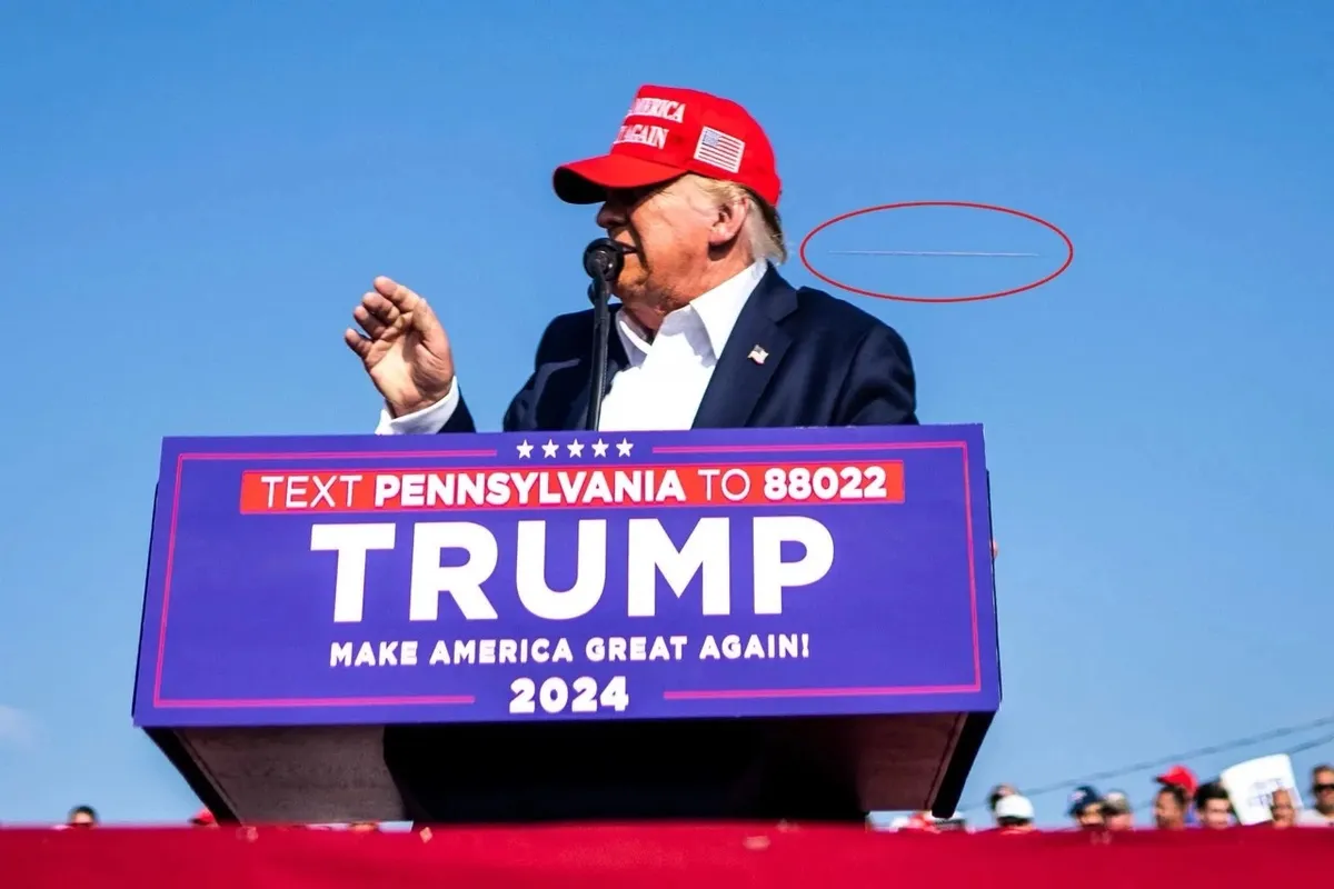 Bức ảnh chụp khoảnh khắc viên đạn sượt qua đầu ông Trump thắng giải báo chí danh tiếng Pulitzer - Ảnh 2.