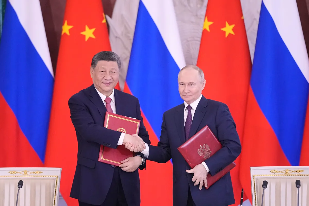 Nga - Trung Quốc ký tuyên bố tăng cường quan hệ đối tác chiến lược toàn diện - Ảnh 2.
