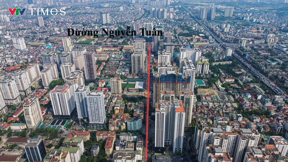 Cận cảnh loạt nhà siêu mỏng xuất hiện tại dự án mở rộng đường Nguyễn Tuân - Ảnh 1.