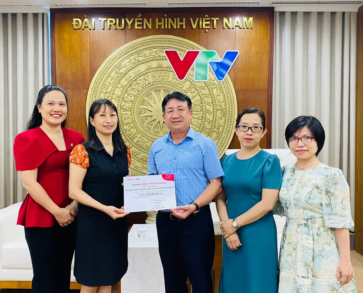 200 triệu đồng được trao tặng cho Trái tim cho em - Ảnh 1.