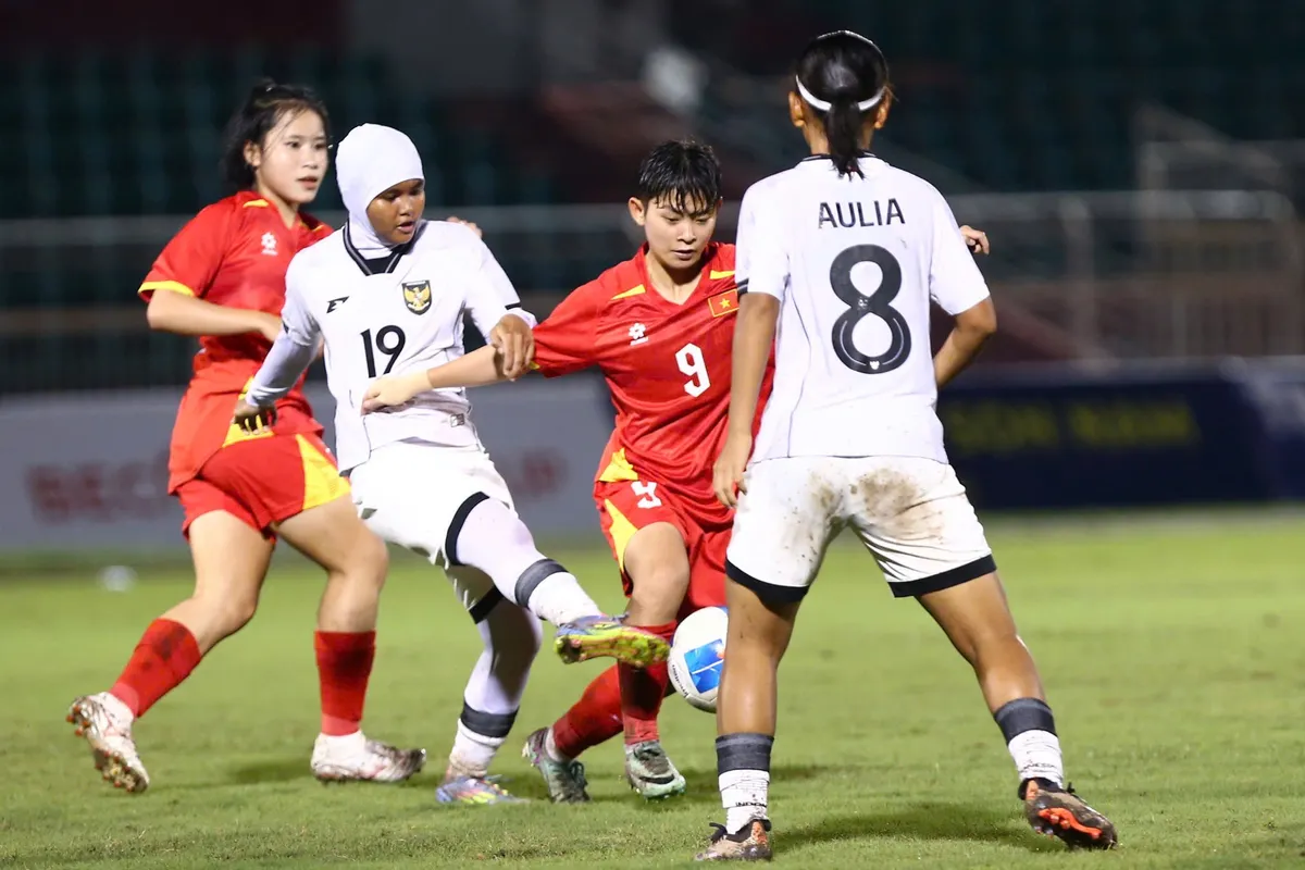 Thắng đậm Indonesia, U19 nữ Việt Nam tái ngộ Thái Lan ở chung kết Đông Nam Á - Ảnh 1.