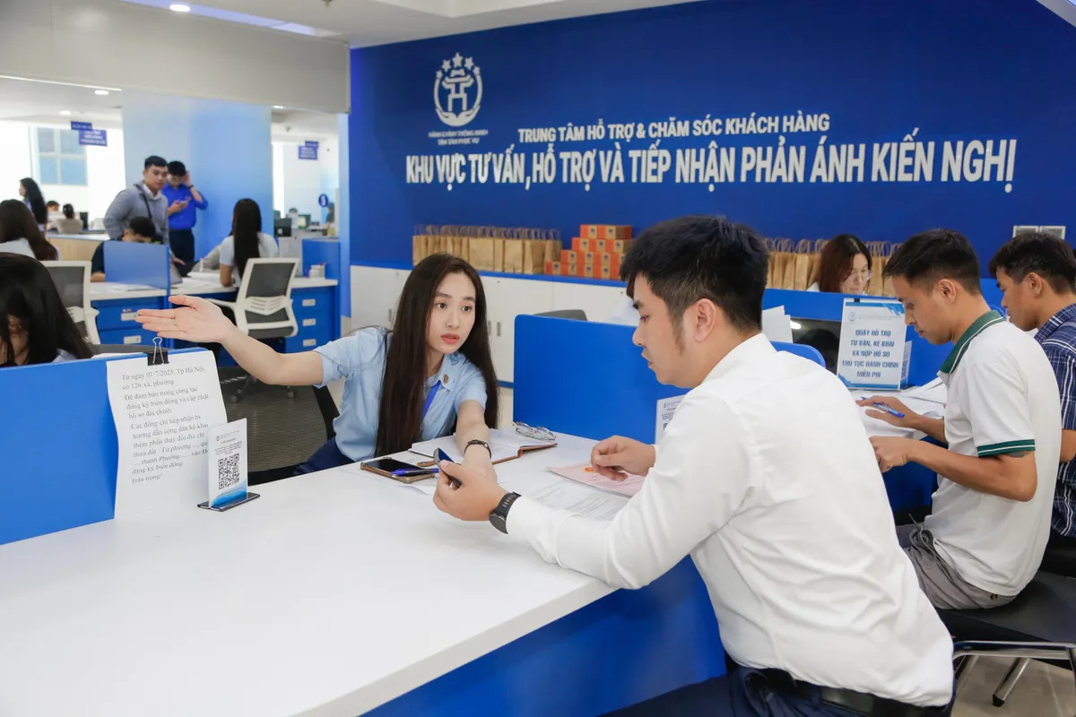 Hà Nội phê duyệt tái cấu trúc 90,5% thủ tục hành chính - Ảnh 1.