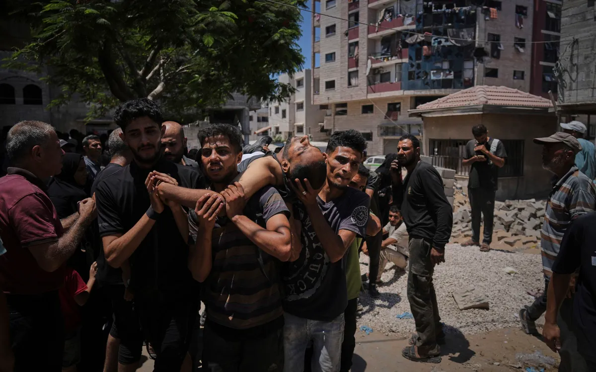 Người dân Palestine thiệt mạng khi đi nhận viện trợ ở phía Bắc Dải Gaza hôm 20/7 (Ảnh: AP) Người dân Palestine thiệt mạng khi đi nhận viện trợ ở phía Bắc Dải Gaza hôm 20/7 (Ảnh: AP)