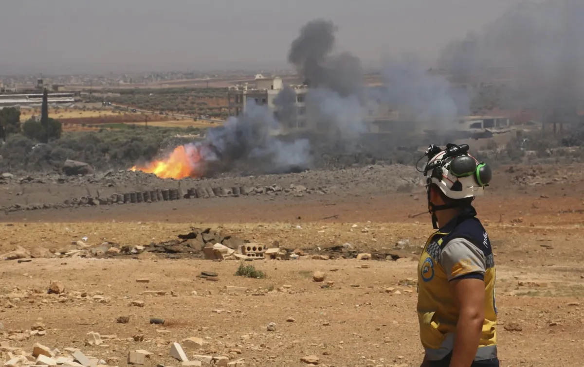 Nổ lớn rung chuyển Syria, gần 150 người thương vong - Ảnh 1.