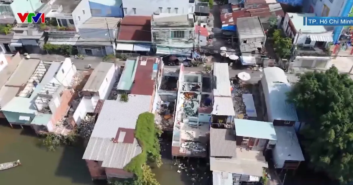 Người dân bờ bắc Kênh Đôi (TP Hồ Chí Minh) được thưởng thêm tiền khi bàn giao mặt bằng sớm - Ảnh 1.