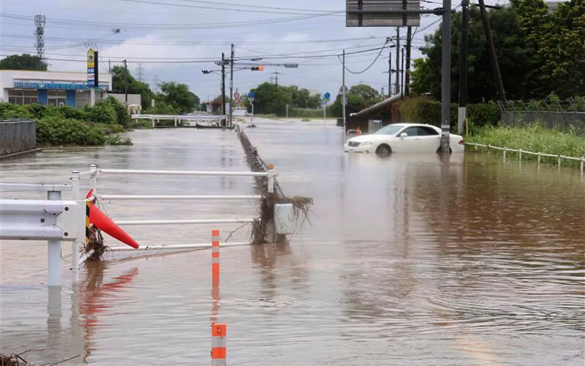 Đường phố ngập do mưa lớn ở tỉnh Kumamoto, Nhật Bản ngày 11/8/2025 (Ảnh: Kyodo News/AP) Đường phố ngập do mưa lớn ở tỉnh Kumamoto, Nhật Bản ngày 11/8/2025 (Ảnh: Kyodo News/AP)