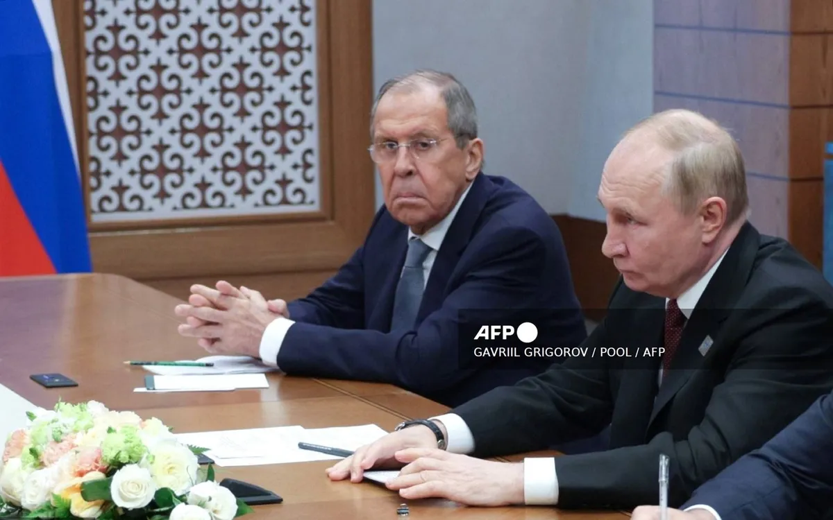 Tổng thống Nga Vladimir Putin và Ngoại trưởng Nga Sergey Lavrov (Ảnh: AFP)