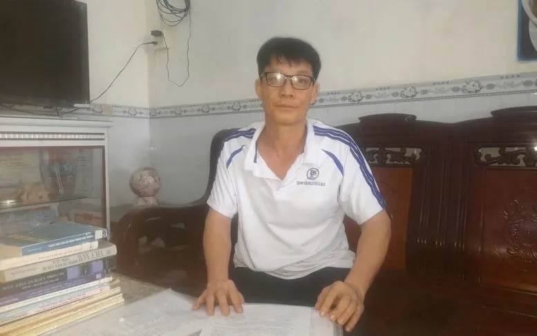 Ông Trần Văn Tâm tại gia đình sáng 17/8, sau 1 năm 1 ngày bị tạm giam. Nguồn: VGP