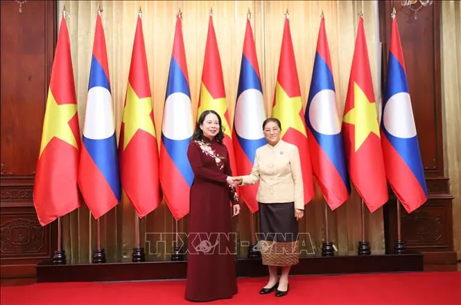 Tăng cường hơn nữa quan hệ đặc biệt Việt Nam - Lào - Ảnh 2.